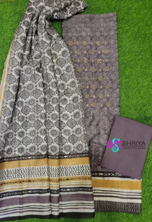 Ajrakh dyed maheshwari silk top paired with a ajrakh dyed pure Kota cotton dupatta and cotton bottom